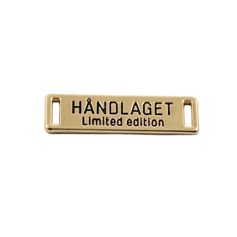 Håndlaget Merke metall 